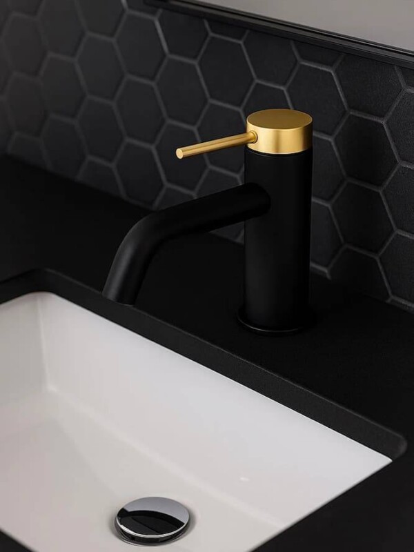 grifo lavabo negro y dorado